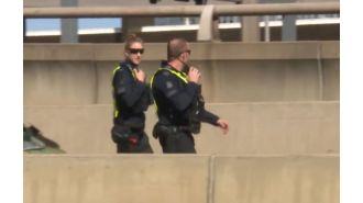 Police create strong barrier to handle expected large crowd of 25,000 demonstrators in Melbourne.