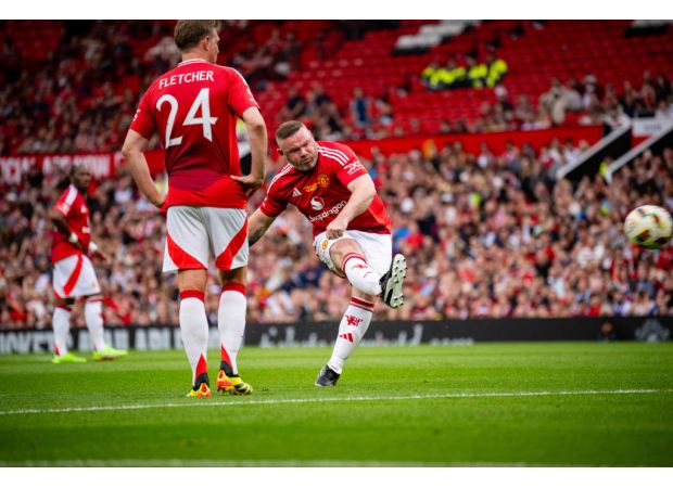 Wayne Rooney jokes about his own skills after scoring impressive free-kick for Manchester United Legends.