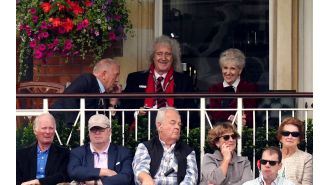 Queen guitarist Brian May seen at cricket game after admitting to frightening stroke.