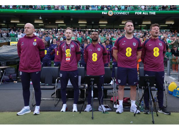 Lee Carsley says singing national anthem at future England games is necessary