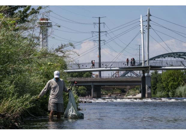 Cleaning up Denver's South Platte River for swimming is a difficult task due to various challenges.