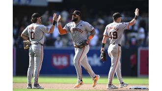 Tensions between SF Giants' rookie infielders overshadow victory against playoff-hopeful Padres.
