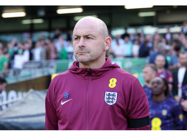 Lineker backs Carsley after criticism for not singing national anthem.