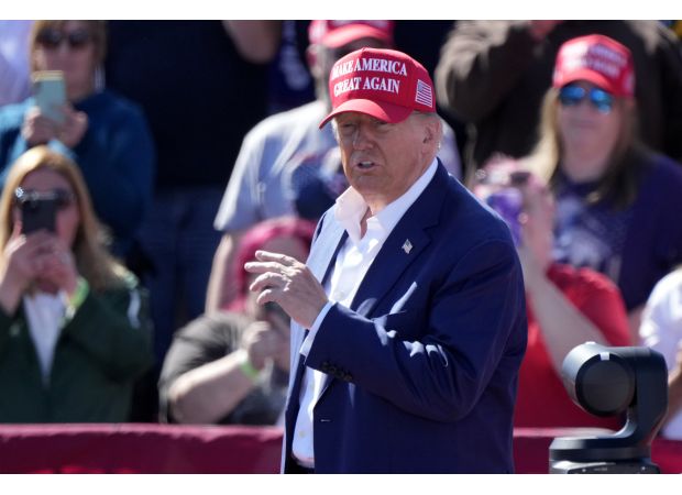 Trump warns opponents they face imprisonment.