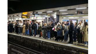 London commuters experiencing long delays due to engineering work during rush hour.