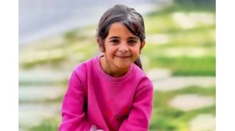 8-year-old girl's body discovered in river, stuffed in a sack and weighted down with stones.