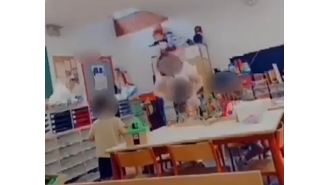 Controversy over teacher striking crying girl who calls for mother.