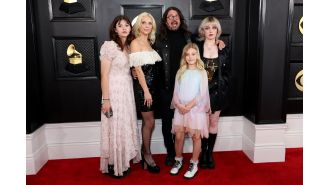 Rock star Dave Grohl reveals secret child and discusses his wife and other kids.