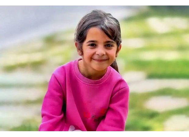 8-year-old girl's body discovered in river, stuffed in a sack and weighted down with stones.