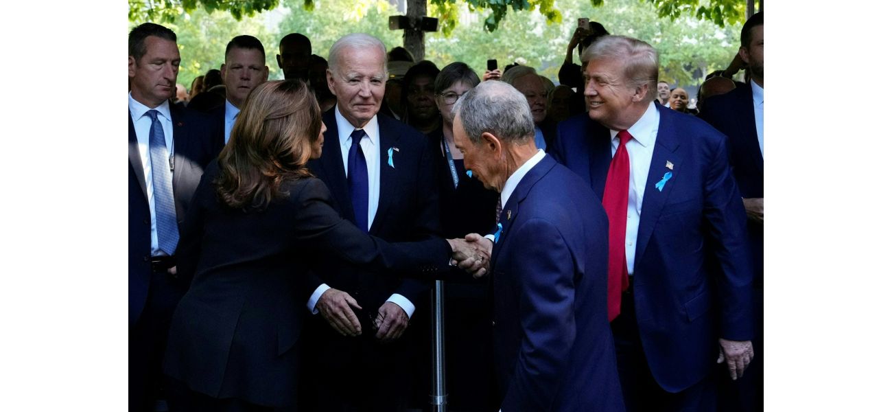 Trump greets Harris with insincere smile, leaning over Biden.