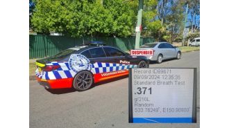 Woman caught with excessive alcohol in car while driving to pick up children.