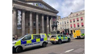 A man died from falling off a balcony in an art gallery.