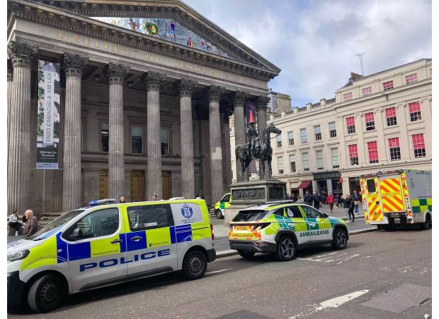 A man died from falling off a balcony in an art gallery.