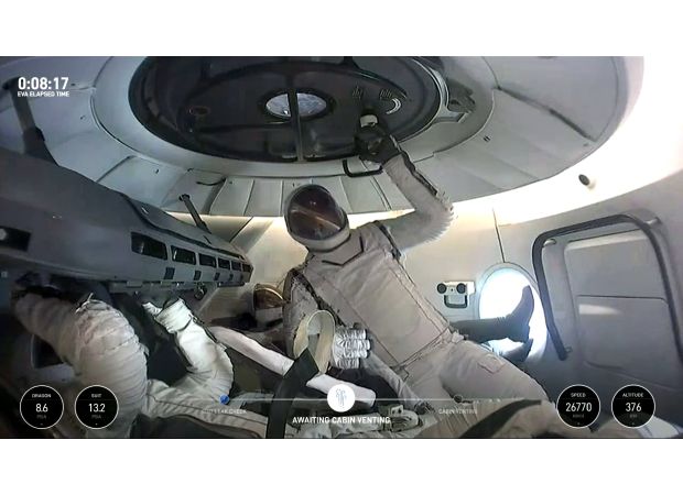 See live footage of billionaire's first private spacewalk ever.