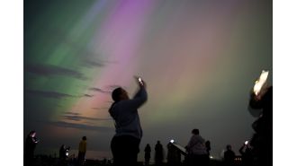 Possible paraphrase: 
Possible northern lights sighting tonight - location guide provided.