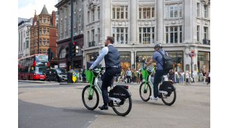 New AI traffic lights may benefit cyclists by changing signals to give them priority over vehicles.