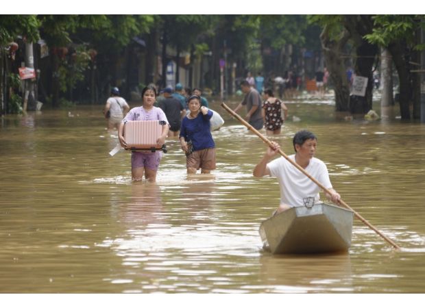Australia commits $2m in aid to help Vietnam following devastating typhoon. Death toll continues to rise.