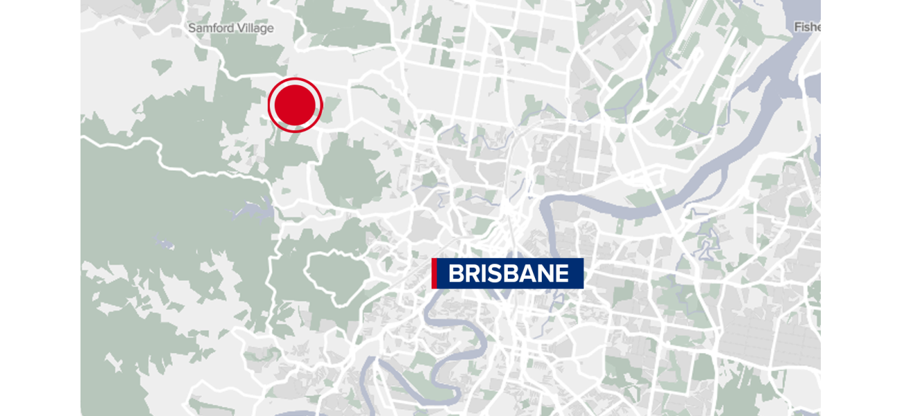 Body discovered in rural wooded area near Brisbane's outskirts.