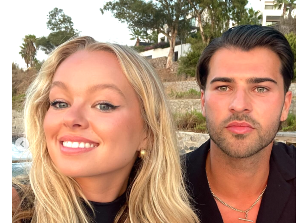 Famous pair from TV show happily vacationing overseas, radiating with love.