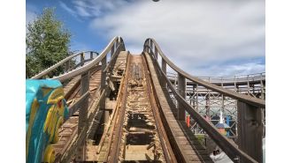 Ancient British rollercoaster falling apart while riders are on it.