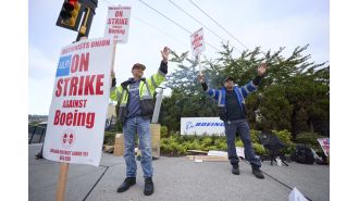 Boeing factory employees strike after rejecting contract proposal.