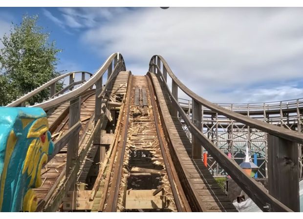 Ancient British rollercoaster falling apart while riders are on it.