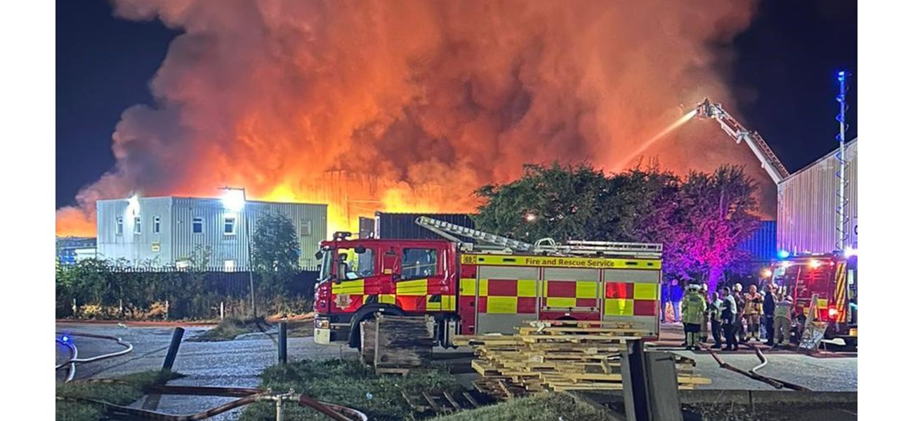 Massive fire raging at recycling facility could continue for entire weekend.