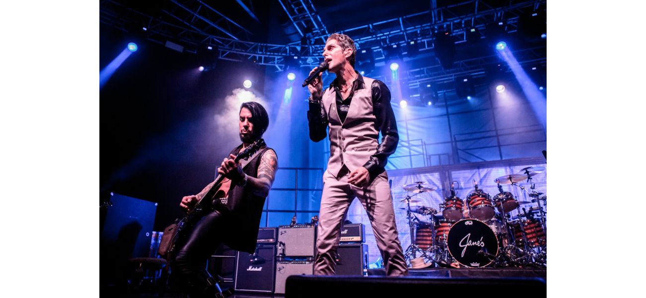 80s rock band's reunion show turns violent as member is forcibly removed from stage mid-performance.