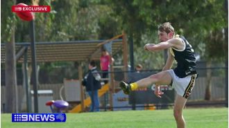 A teenager was airlifted to hospital in critical condition following a violent football game.
