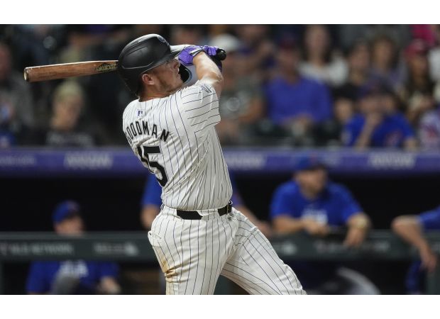 Rockies defeat Cubs thanks to Goodman's standout performance and Gomber's solid pitching.