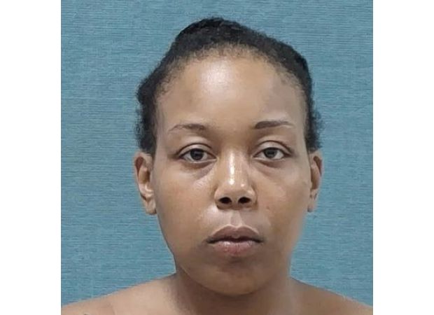 Police have shared a disturbing video of a woman who was caught consuming a cat, showing her with fur on her lips.