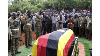 Ugandan Olympian killed by partner honored with military funeral.