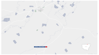 Two individuals believed to be deceased following vehicle accident at NSW-Queensland border.