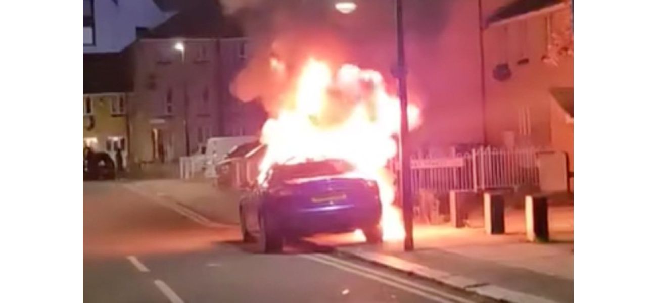 Car catches fire on London street, parked illegally.
