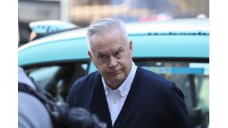 Huw Edwards arrived at court for his sentencing, with a suitcase in tow.