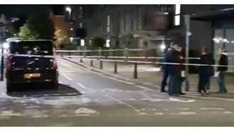 A woman is accused of killing another woman by stabbing her in a London apartment.