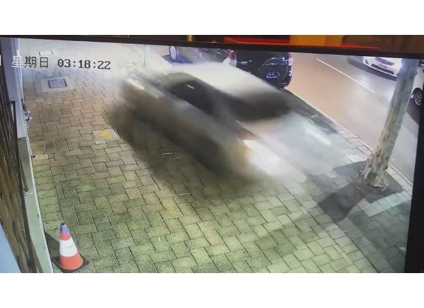 Cab crashes into restaurant just after rider attacks driver.