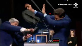 Candidate in Brazil assaults opponent on live TV with chair.