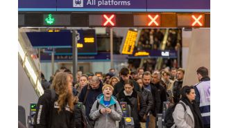 Fire near London train tracks causes major disruption at busy stations.