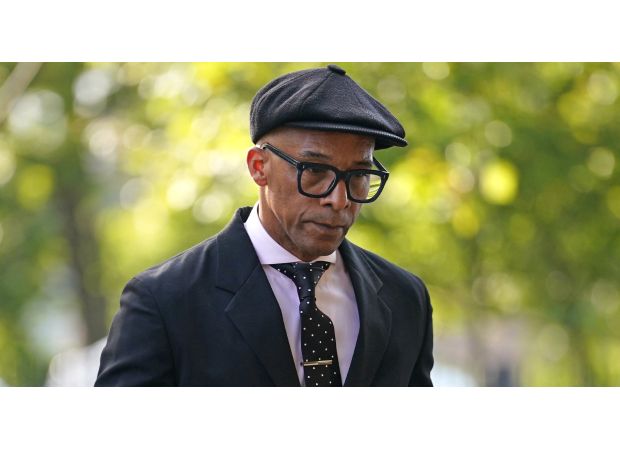 Jay Blades, a BBC personality, appears dejected heading to court over a traffic violation.