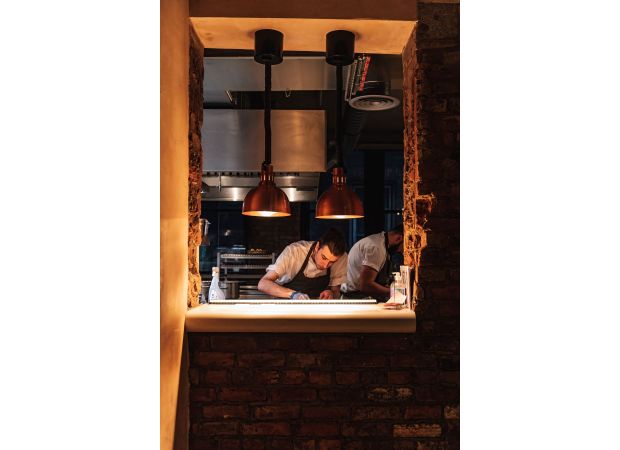 The Alan, Dine & Drink is a restaurant that offers both food and drinks.