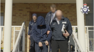 Police arrest leader of 'Ghost' network as part of major raids.