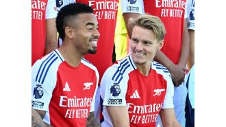 Arsenal fans are concerned about Martin Odegaard's injury after noticing something in a team photo.