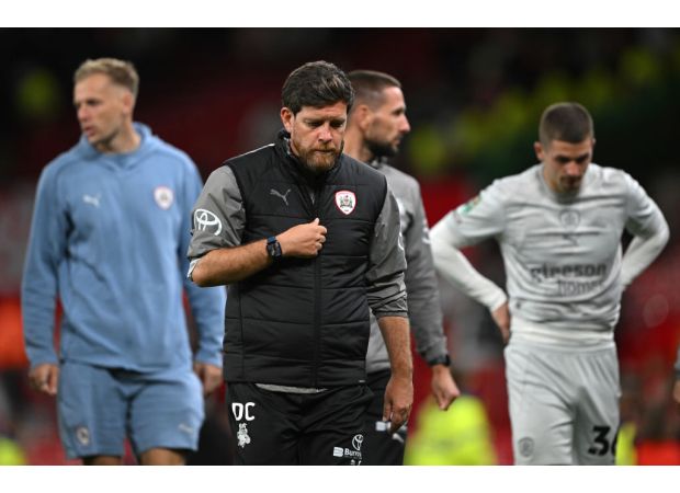 Barnsley manager unhappy with team's performance in loss to Manchester United.