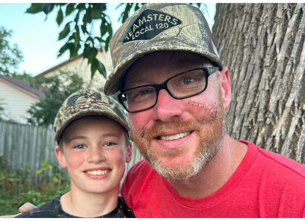 A 12-year-old boy killed a 200-pound bear that was attacking his father.