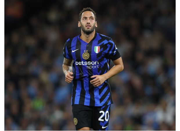 Inter Milan player Hakan Calhanoglu criticizes the atmosphere at Etihad Stadium after their draw against Manchester City.