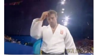 An athlete was suspended for five months after making a religious gesture at the Paris Games.