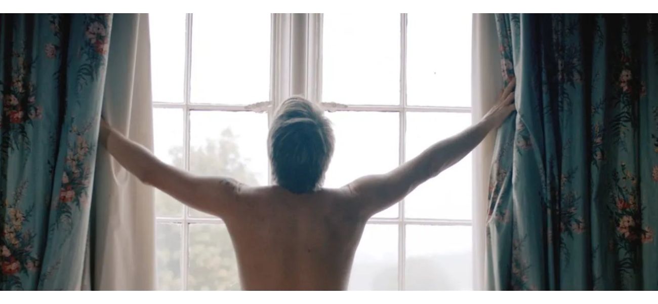 52-year-old 90s music icon bares all in steamy music video.