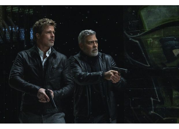 Critics are slamming George Clooney and Brad Pitt's new movie, calling it a terrible and tedious experience.