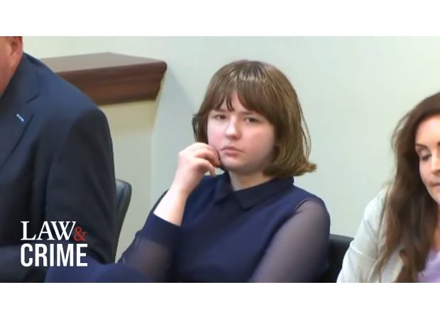 A 15-year-old girl allegedly shot her mother in the face and showed no remorse as she laughed during her court appearance.